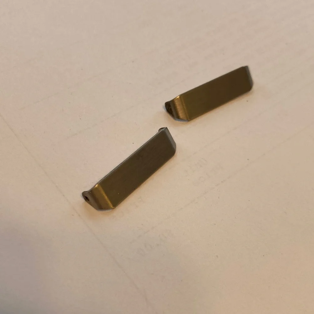 Casio Pro Trek WSD-F20 metal covers for mounting strap to case.  2 covers. Used